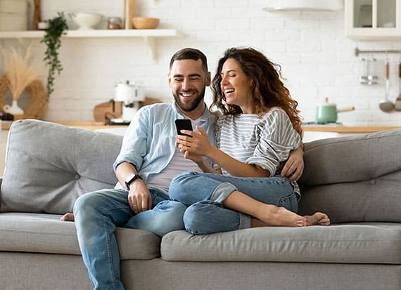 A couple having her online Telehealth consultation from her home
