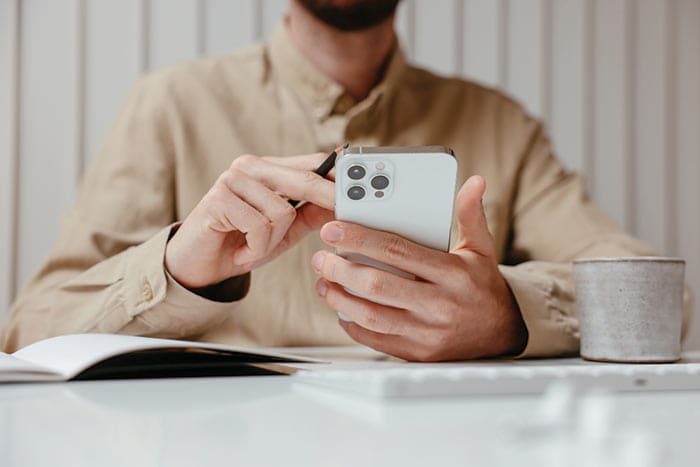 male using his phone