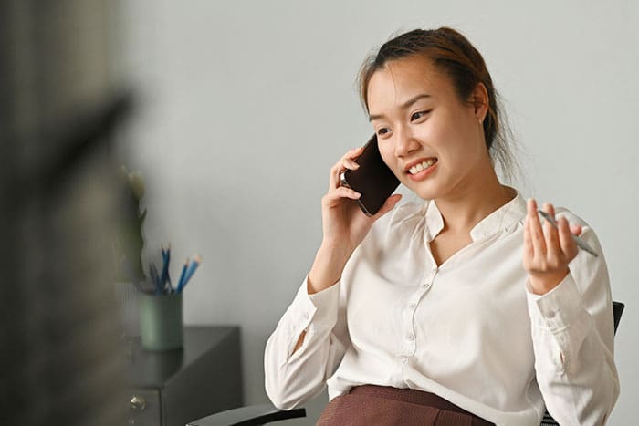 a female talking with her doctor during a Telehealth consultation