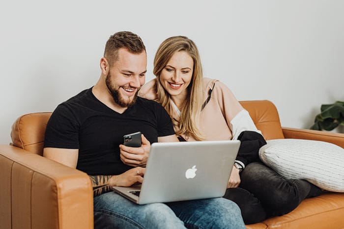a couple having their online Telehealth consultation from her home