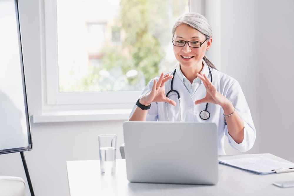 Female doctor having telehealth consultation with her patient