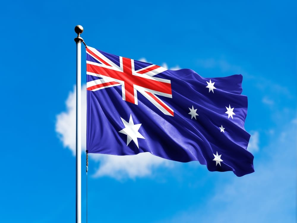 Australian flag waving in the blue sky